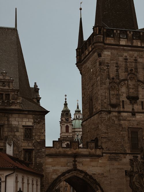 Free Majestic historic towers in Prague, showcasing Gothic architecture and urban charm. Stock Photo