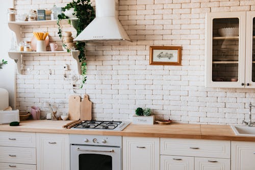 Free Chopping Boards Near Oven Under Hood Stock Photo