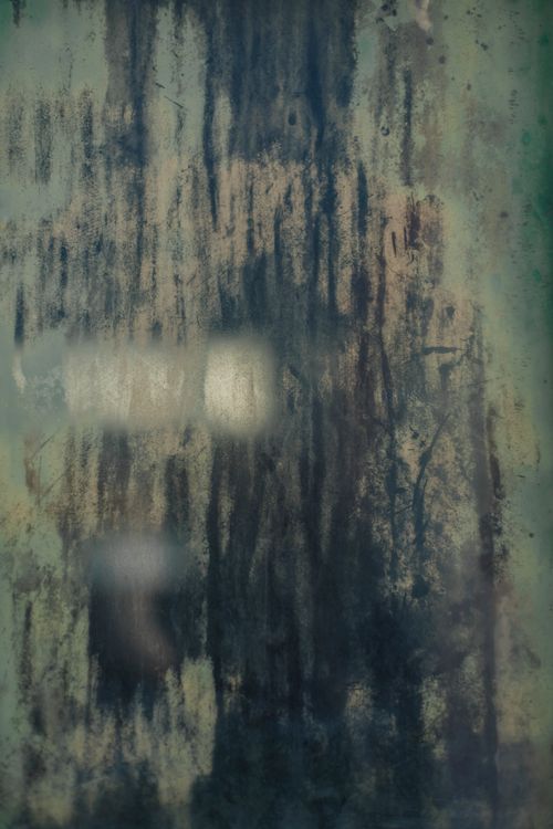 Free Close-up of an abstract textured surface with distressed patterns and earthy tones. Stock Photo