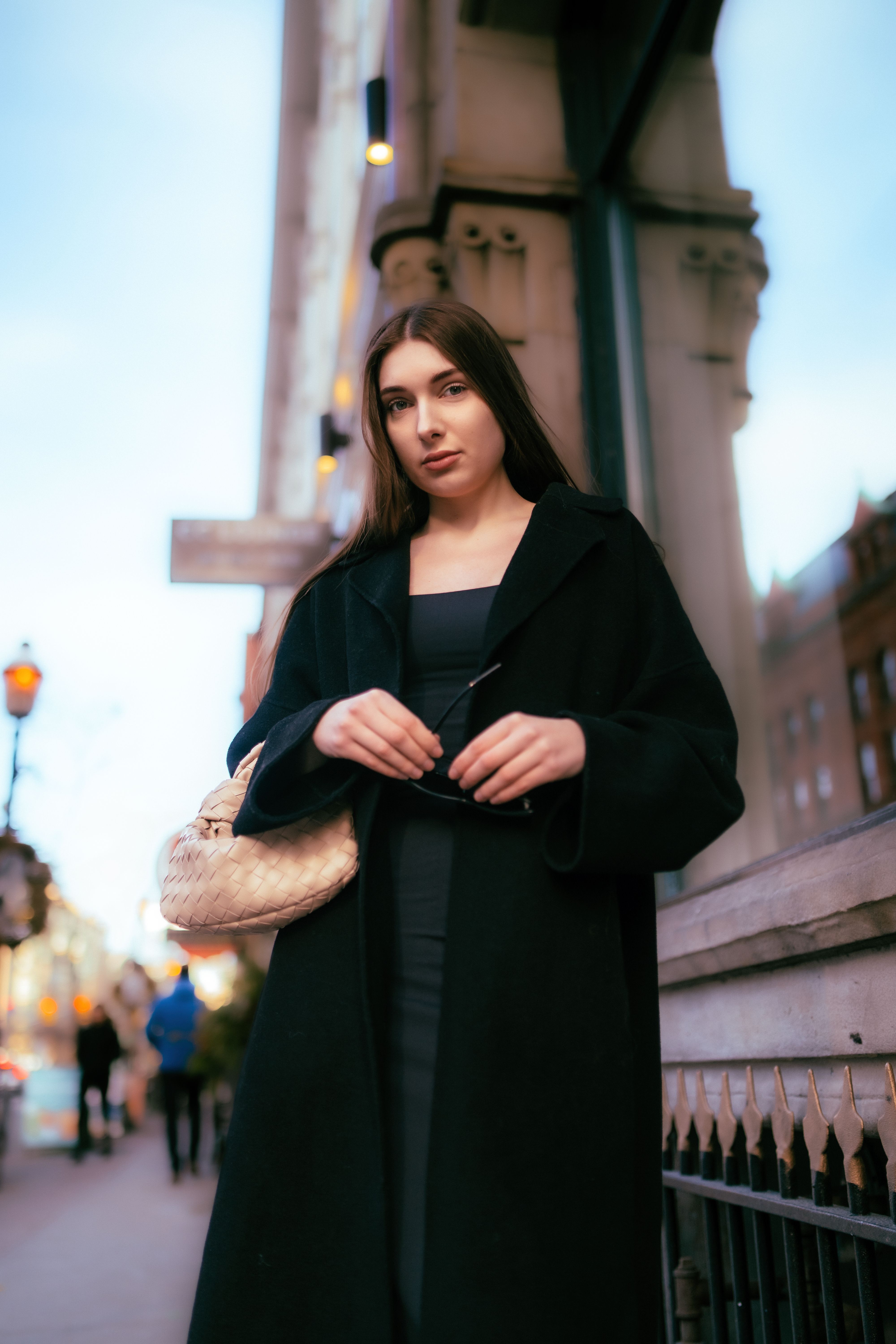Portrait of Woman Standing in Black Coat · Free Stock Photo