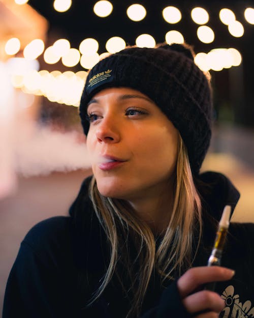 Blonde Woman Vaping 