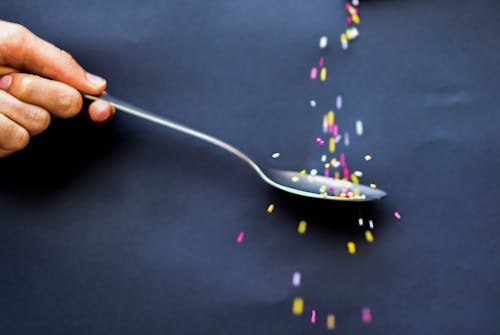 Free Person Catching Sprinkles Stock Photo