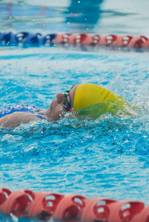 Man Doing Back Stroke Swimming