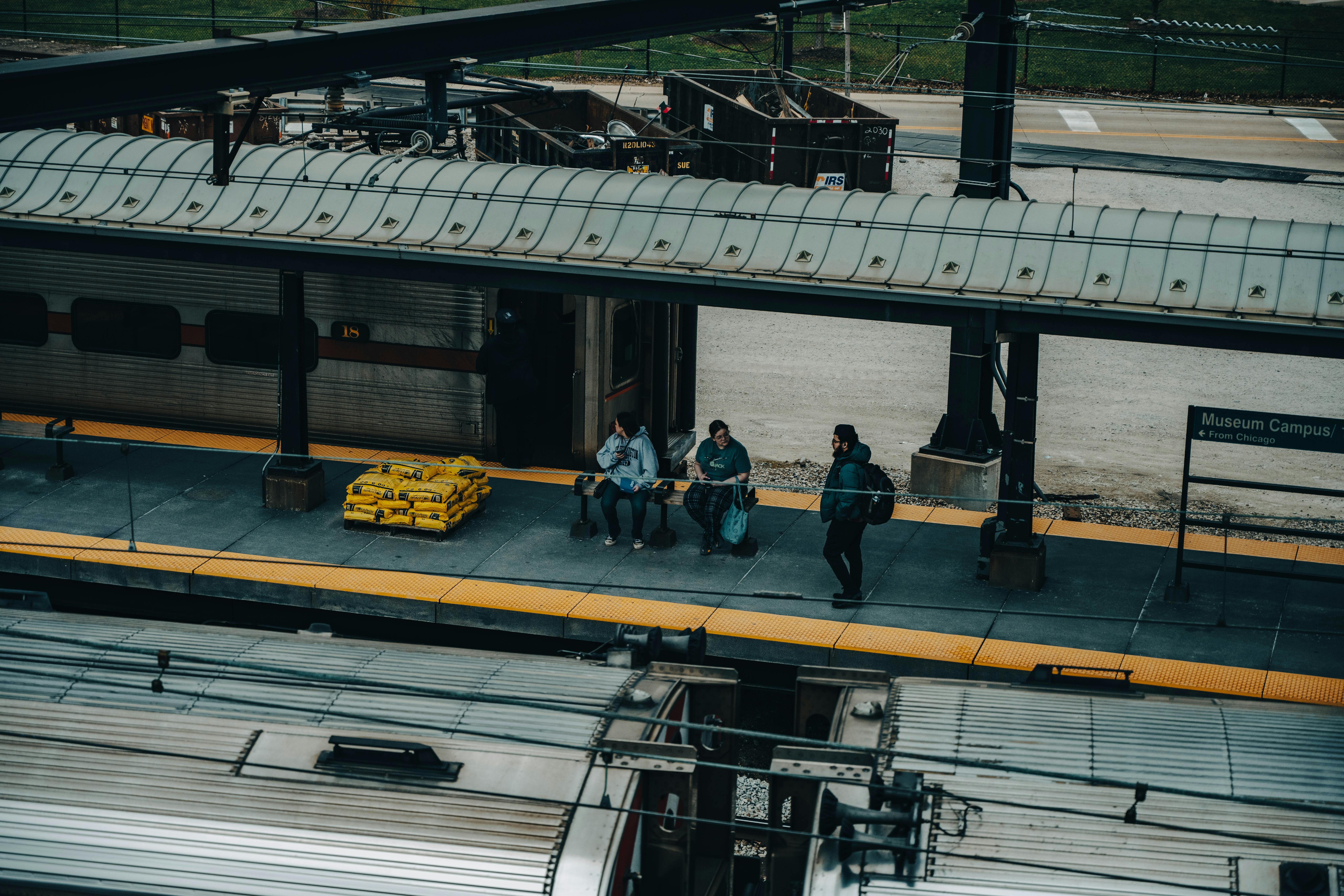 Map showing 10-minute walking radius from University of Chicago campus, highlighting Hyde Park, Woodlawn, and nearby neighborhoods with transit connections - apartments near university of chicago