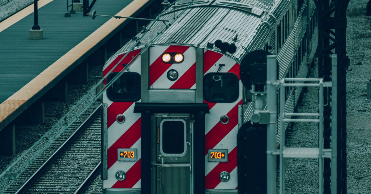 Train Tracks Rear Back of a Train on Railroad Tracks · Free Stock Photo