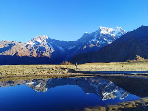 Photos gratuites de chaîne de montagnes, chaukhamba, ciel bleu