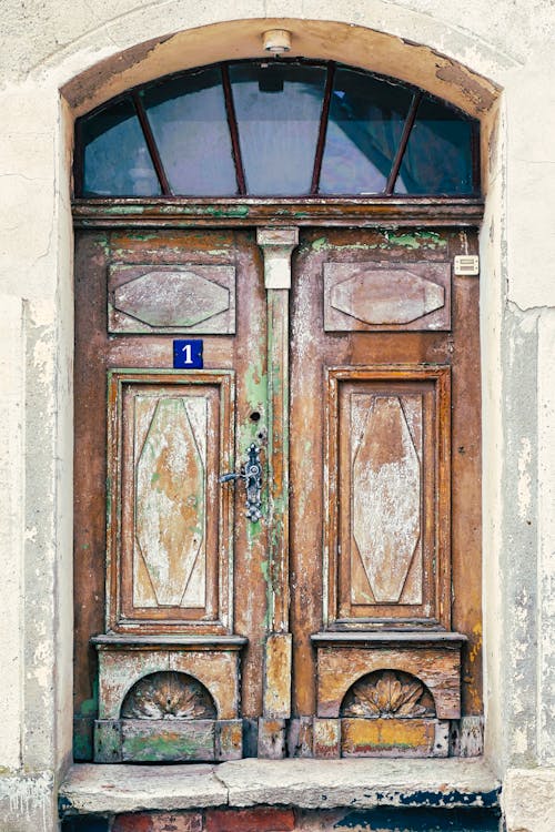 Wooden Entrance Door of an Apartment Building