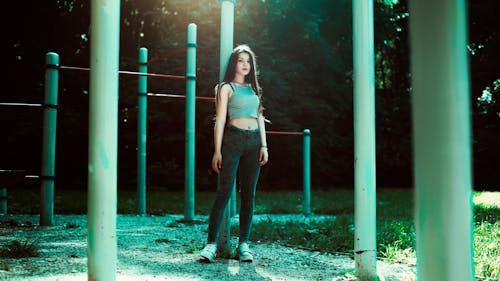 Woman Surrounded With Poles