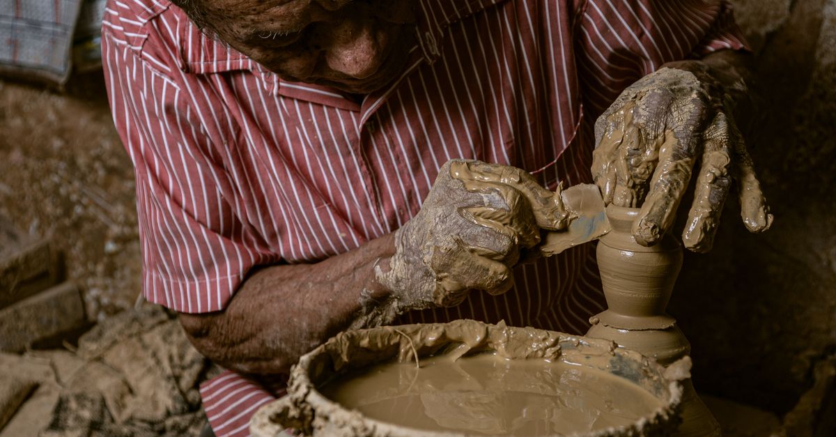 Pot Working Photo of a Man Making a Clay Pot · Free Stock Photo