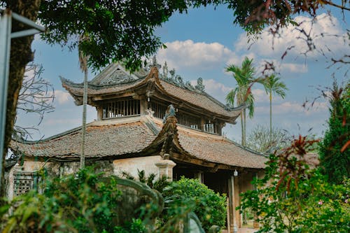 A chinese style building surrounded by trees