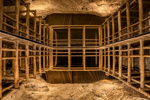 The inside of a cave with wooden beams