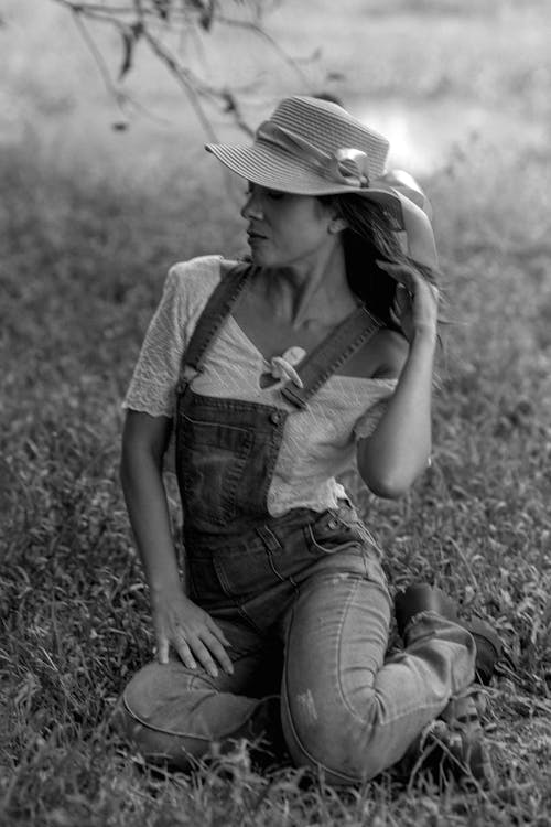 Woman in Sunhat and Jean Overalls
