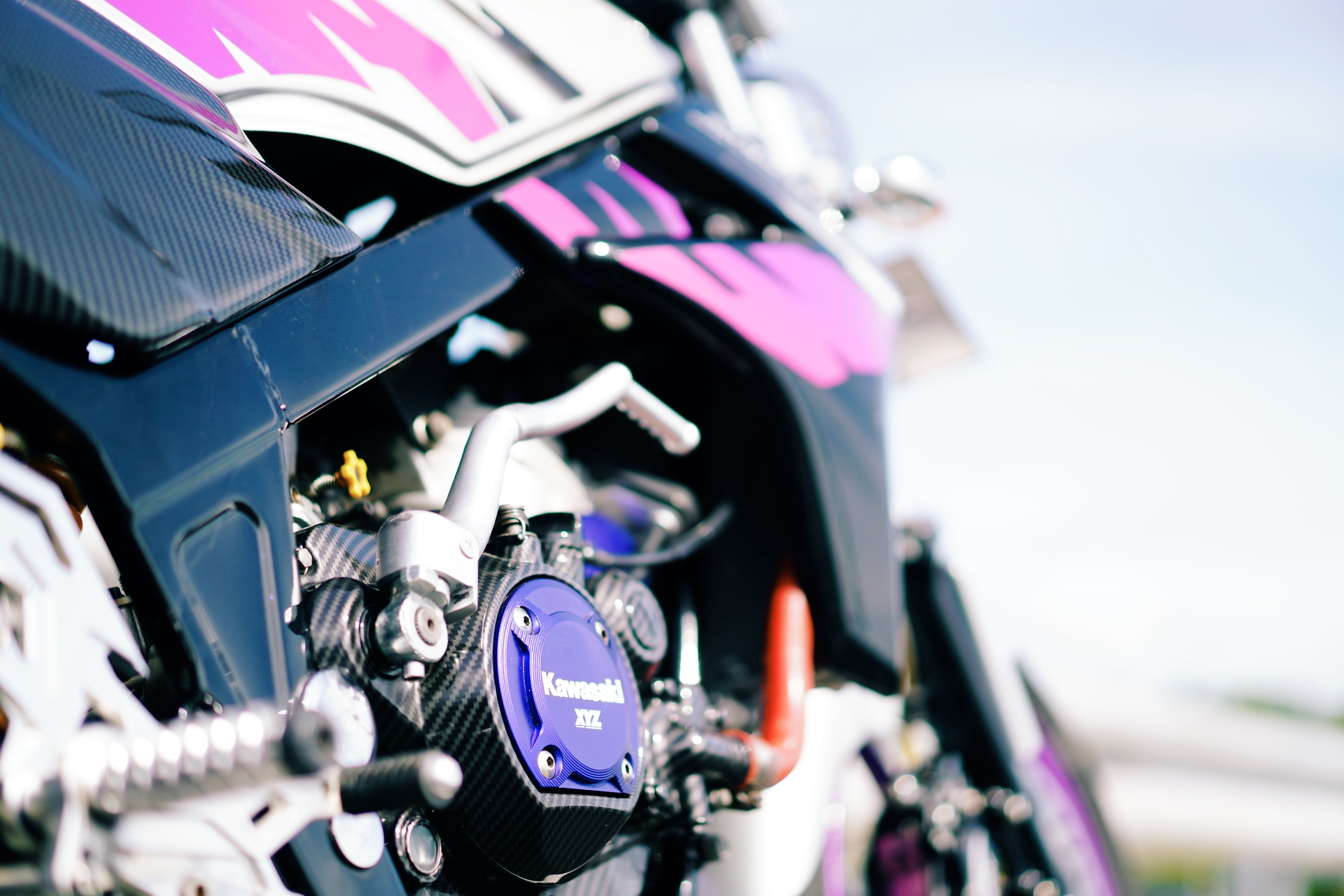 Captivating close-up of a motorcycle engine showcasing metallic textures and design.