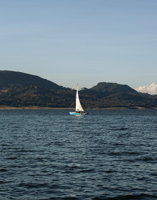 A sailboat is sailing on the water