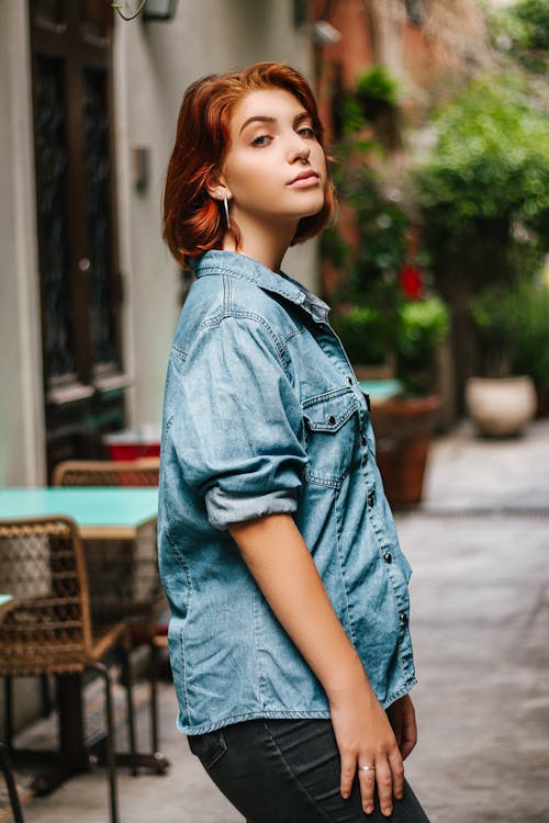 Free Photo of Women In Denim Shirt and Jeans Posing Stock Photo
