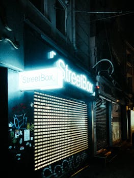 A captivating shot of a neon-lit storefront with graffiti and dynamic lighting in an urban setting.