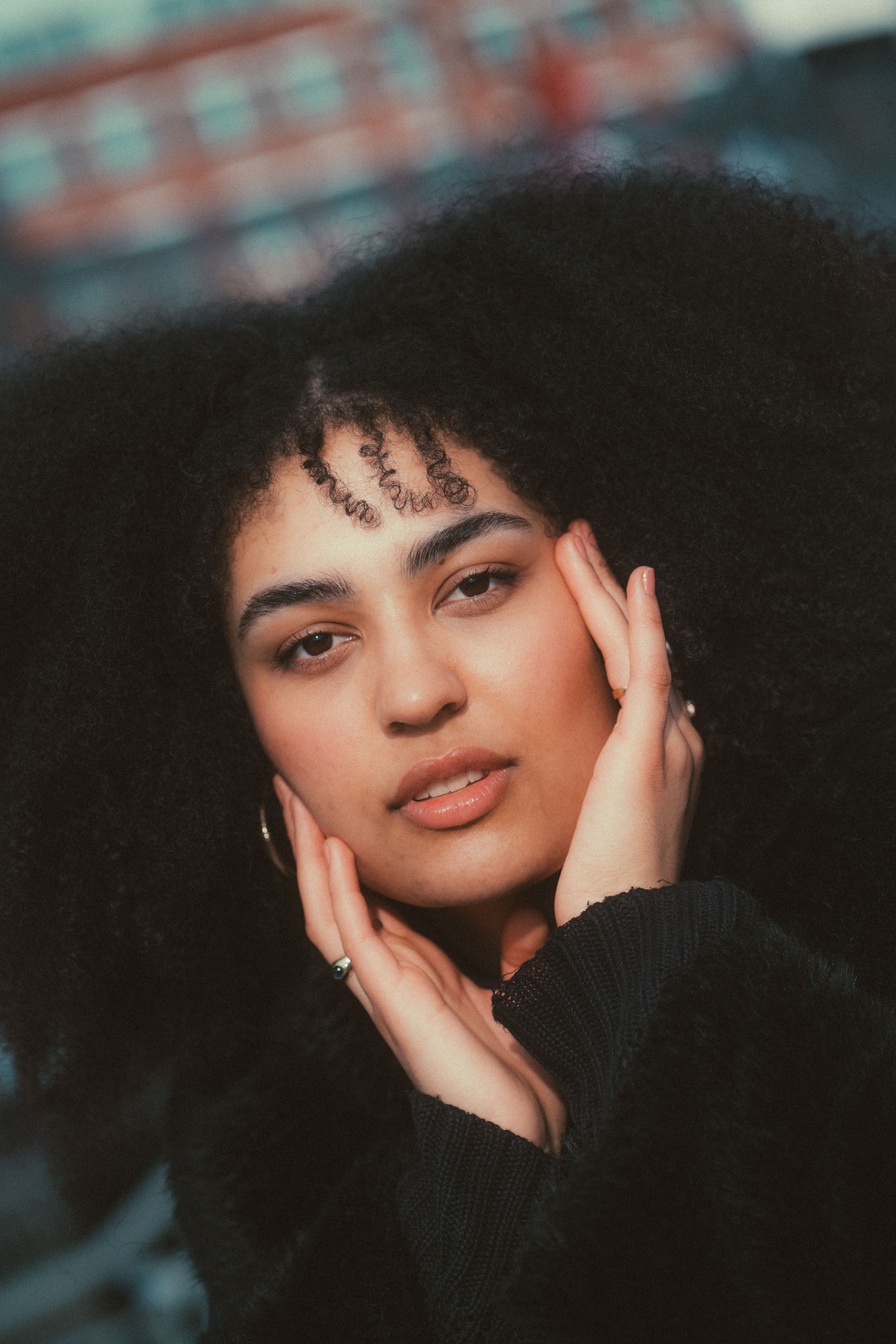 Portrait of Woman with Curly Hair · Free Stock Photo