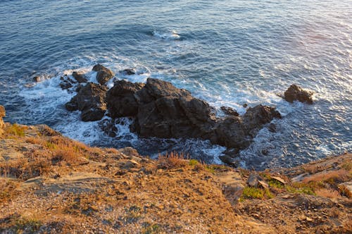 View of Waves Crashing on a Rocky Shore 