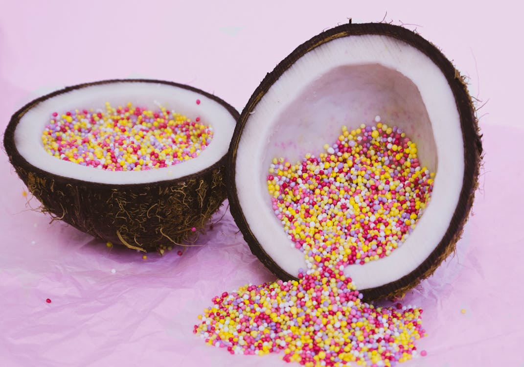 Free Sliced Coconut with Candies Stock Photo
