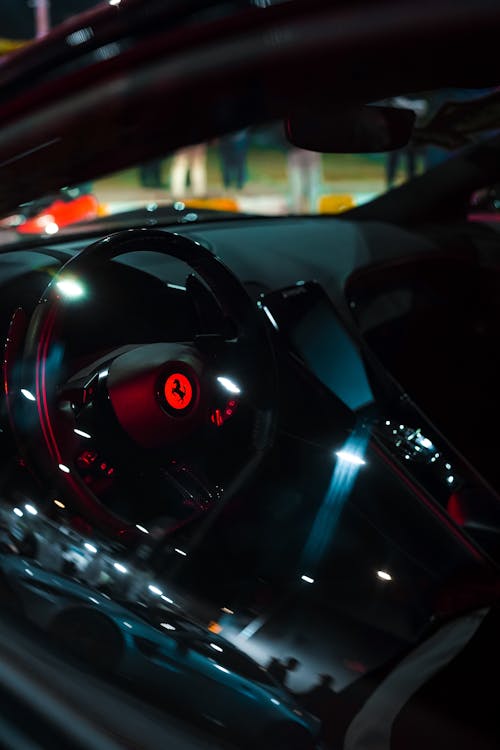 Steering Wheel in Ferrari at Night