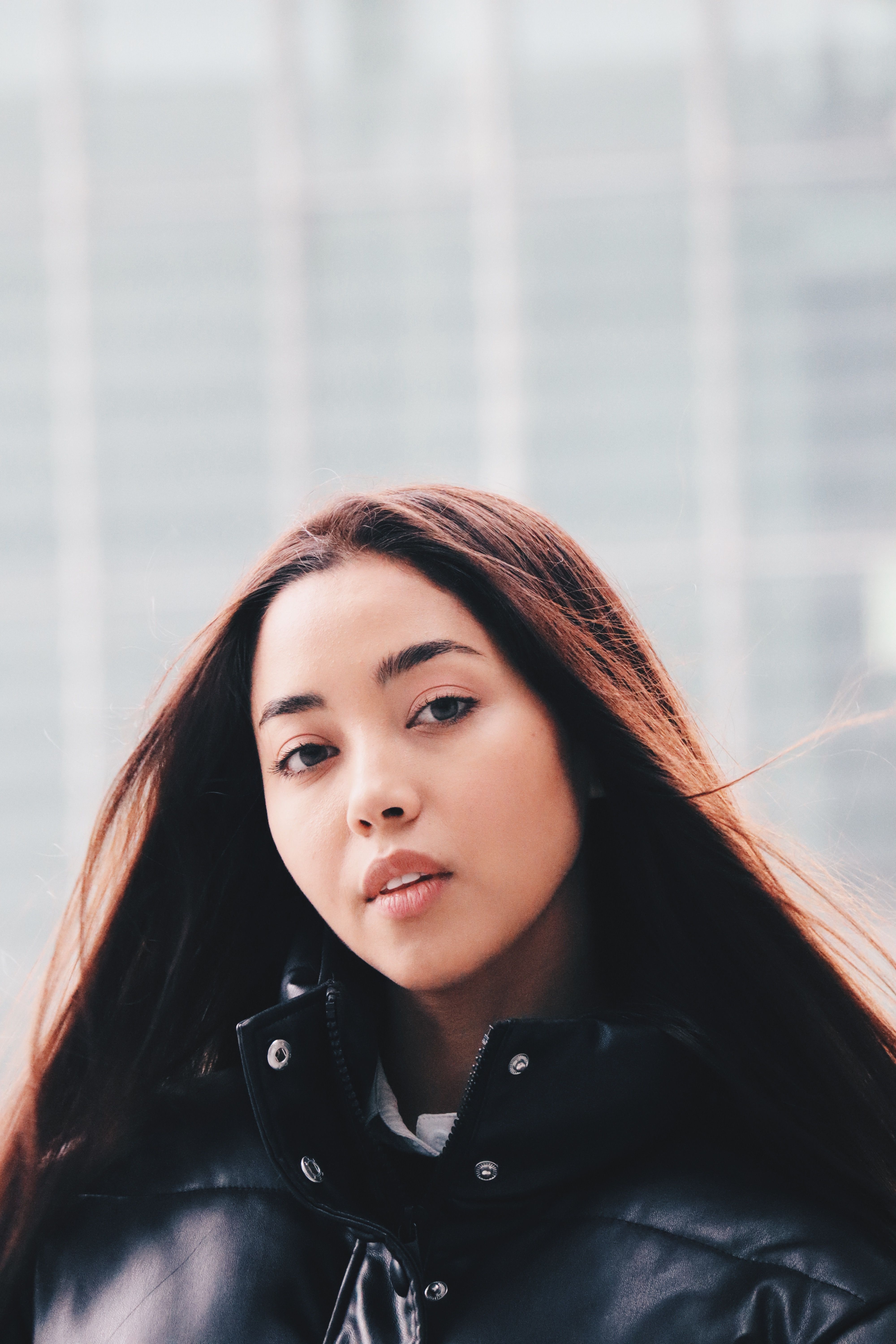 Portrait of a Young Woman in a Black Jacket · Free Stock Photo