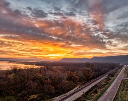 A breathtaking aerial view of a sunset over Weaver, Minnesota, showcasing nature's beauty.