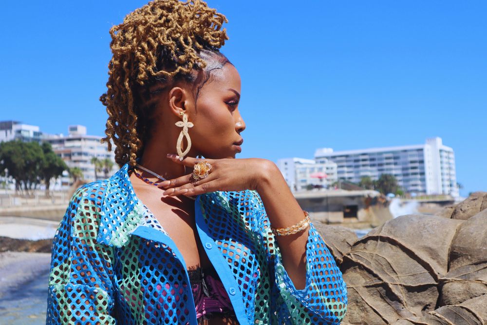 Distressed Butterfly Locs · Shoulder Length — a hair look on BLK GLO