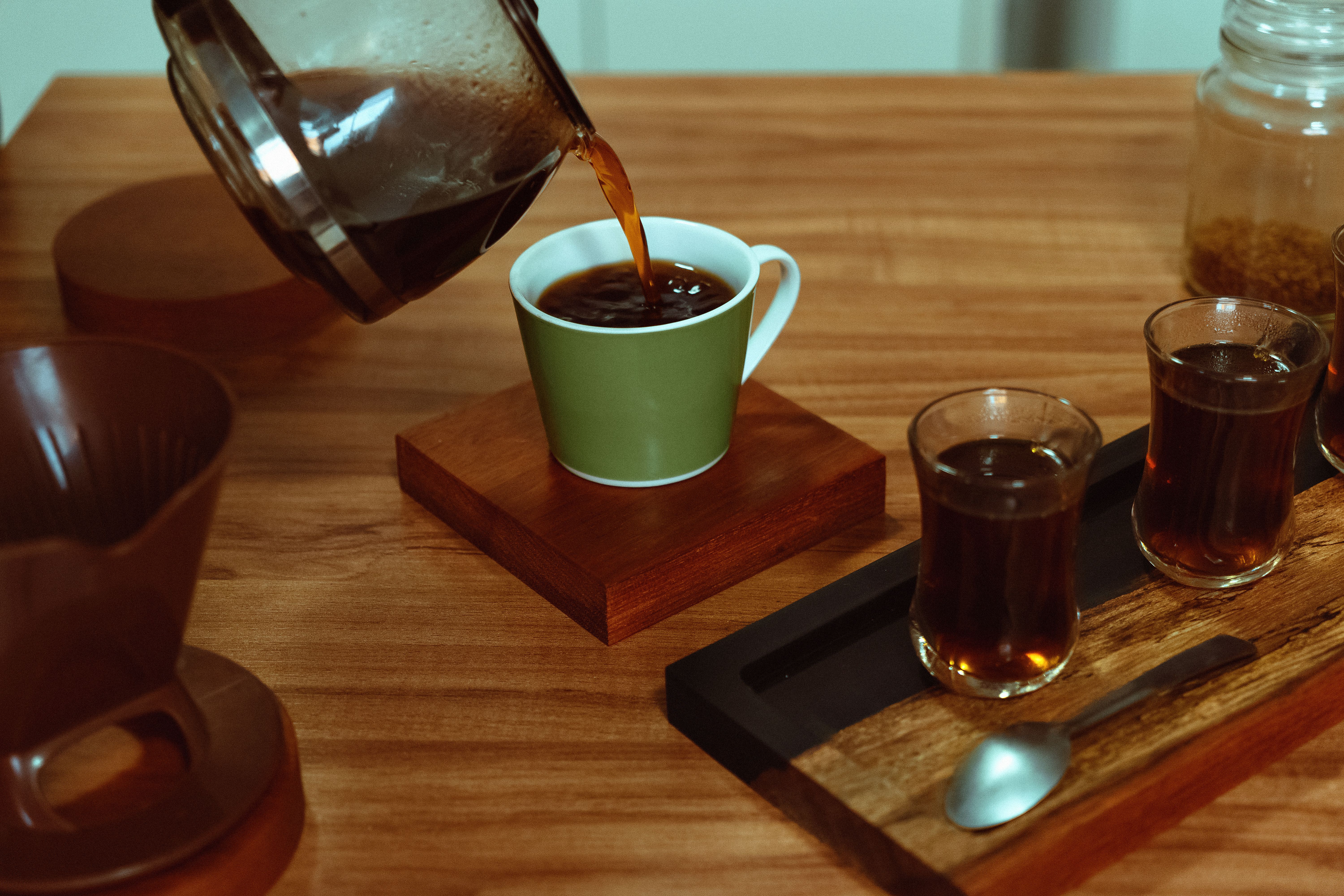 A cupping table with spoons and sample bowls in a Marcala coffee lab