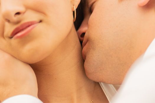 Close-up of a couple sharing an intimate, affectionate moment showcasing love and connection.