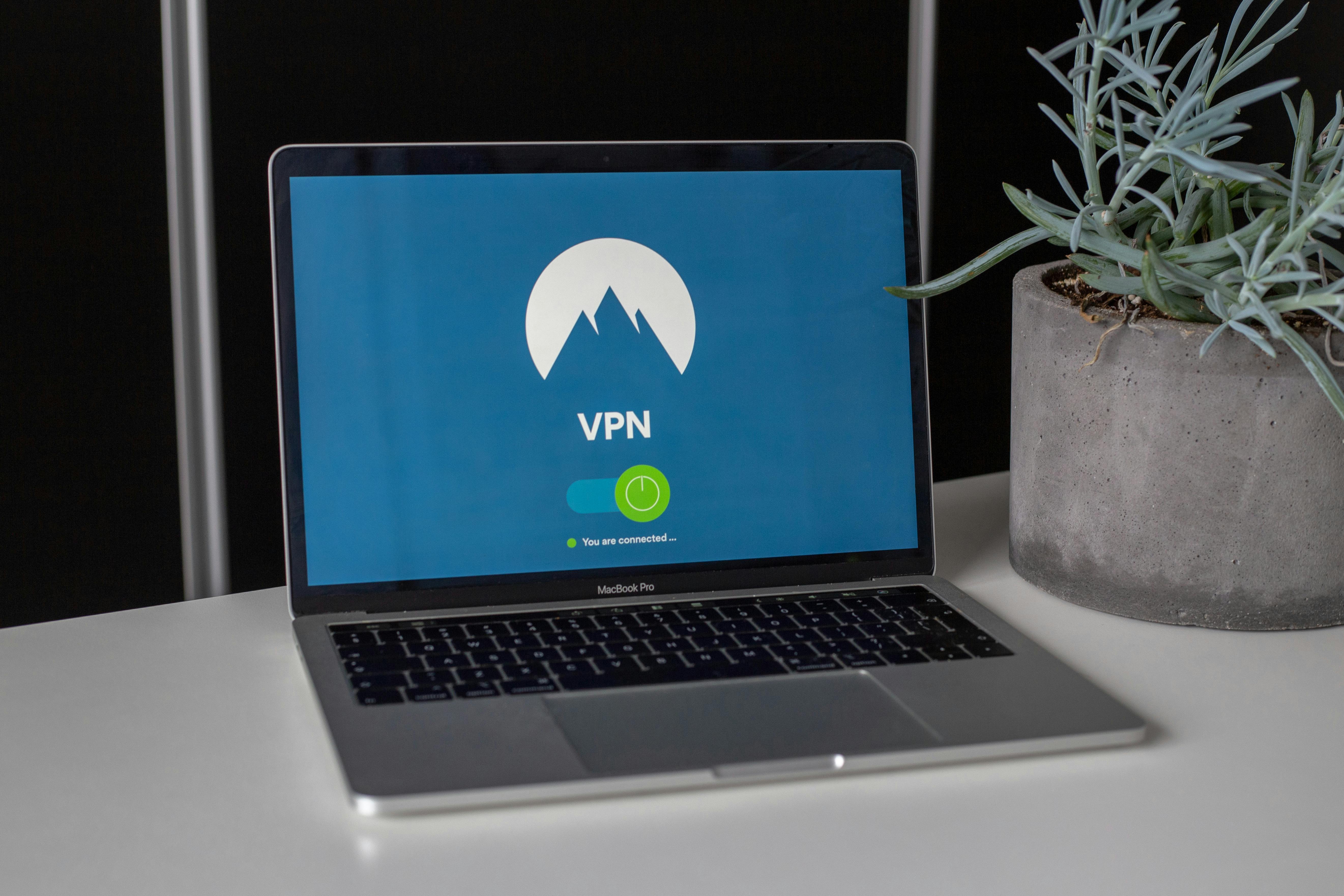 Grey And Black Macbook Pro Showing Vpn Free Stock Photo