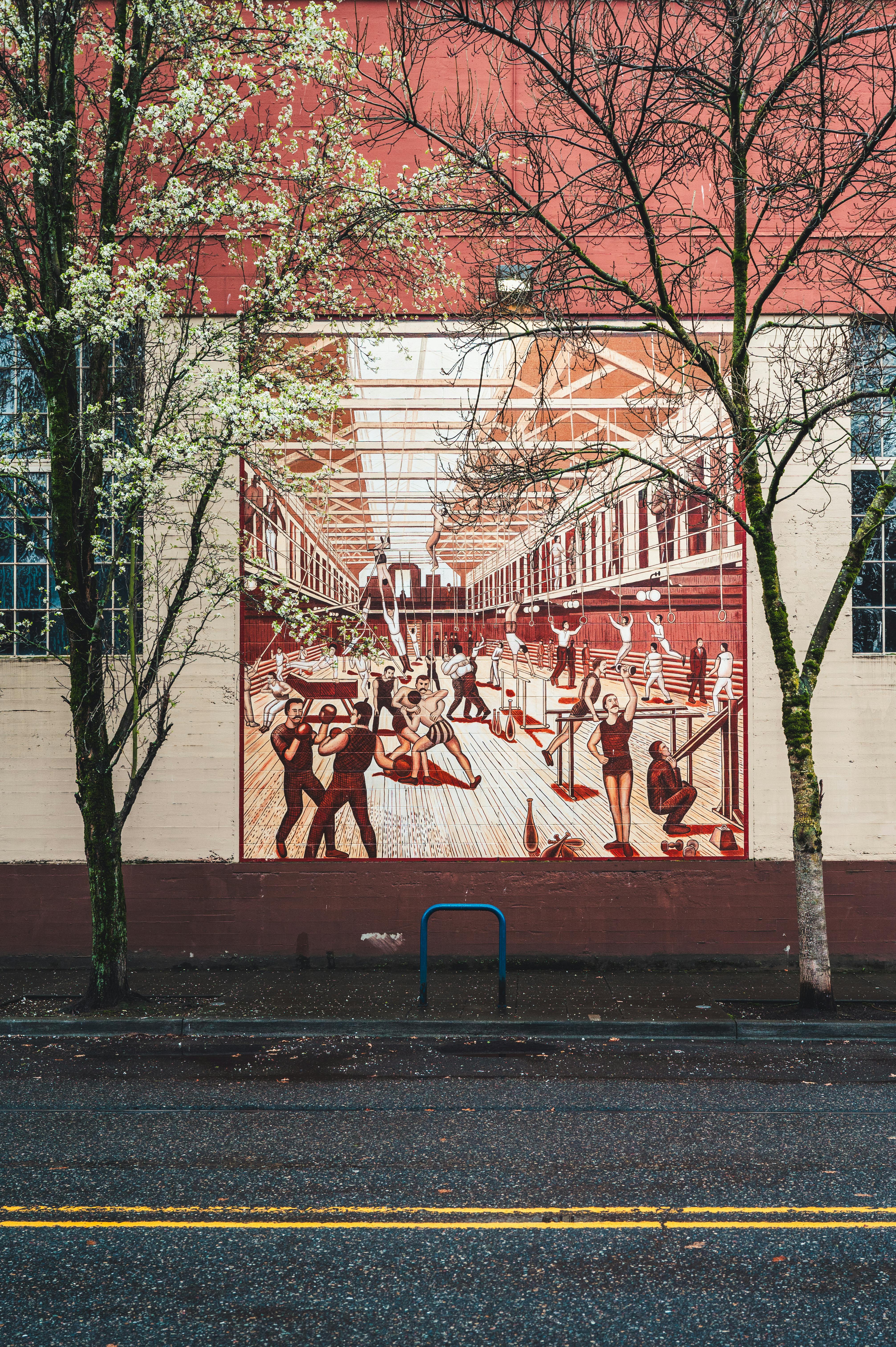 Colorful street mural depicting an indoor scene on a wall in Portland, Oregon.