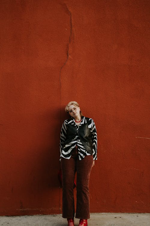 Model Standing by Wall