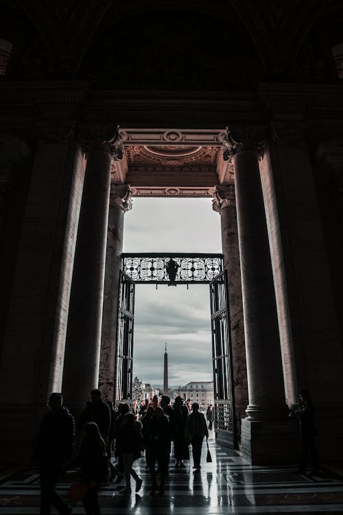 Silhouette of People Near Door