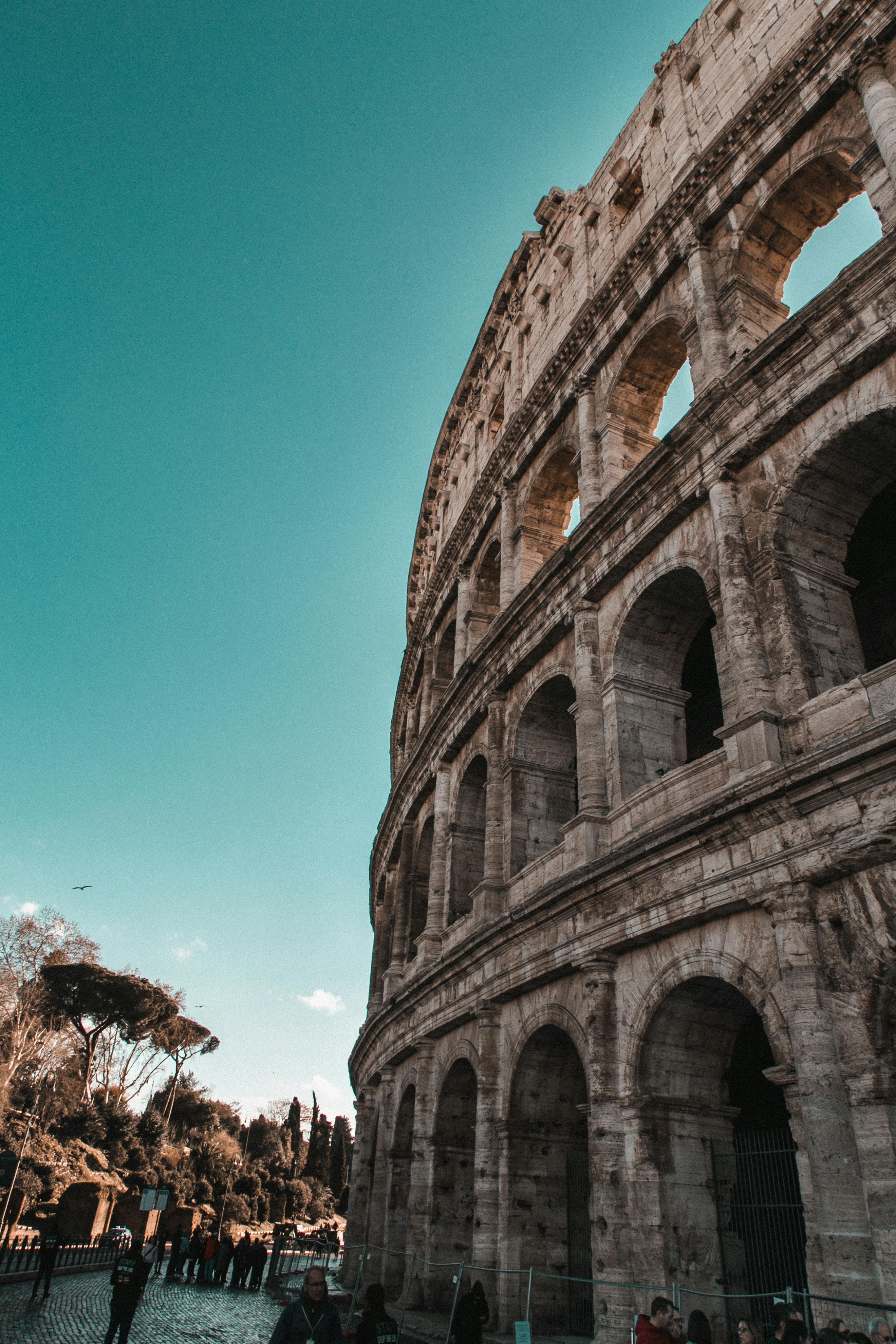 Premium AI Image | The Colosseum or Coliseum at sunrise