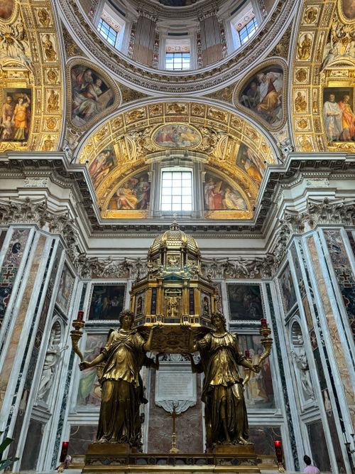 Free Ornate interior view of St. Peter's Basilica highlighting art and architecture. Stock Photo