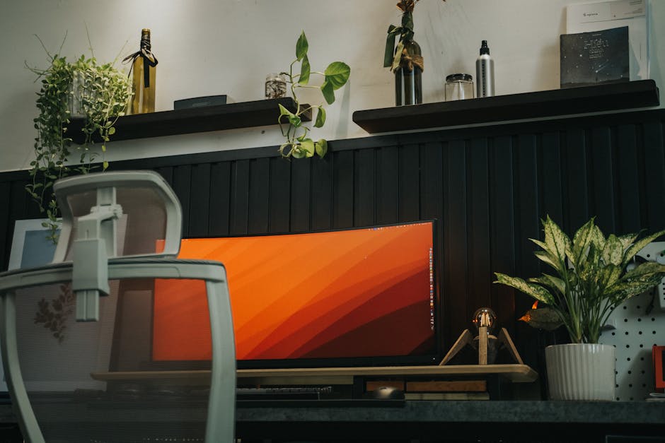 Ultimate Guide to Busting Myths About Home Automation Routines (2025) Stylish home office setup featuring a curved monitor, ergonomic chair, and indoor plants for a modern workspace vibe.