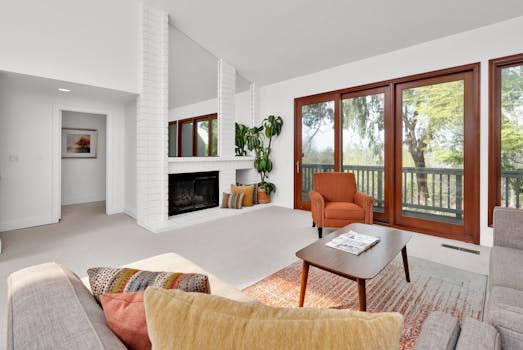 Bright living room with modern design, large windows, and cozy seating in Irvine, CA.