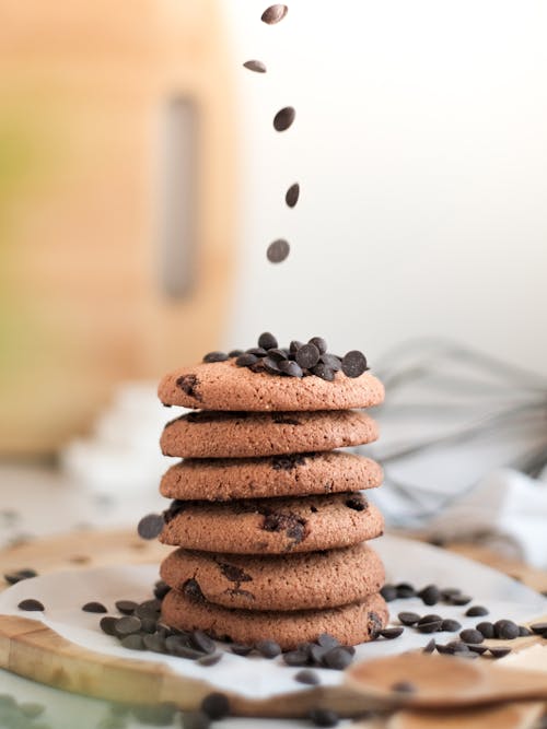 A stack of chocolate chip cookies with sprinkles