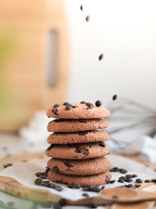 A stack of chocolate chip cookies with sprinkles