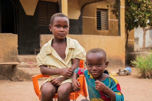 Children in front of a House