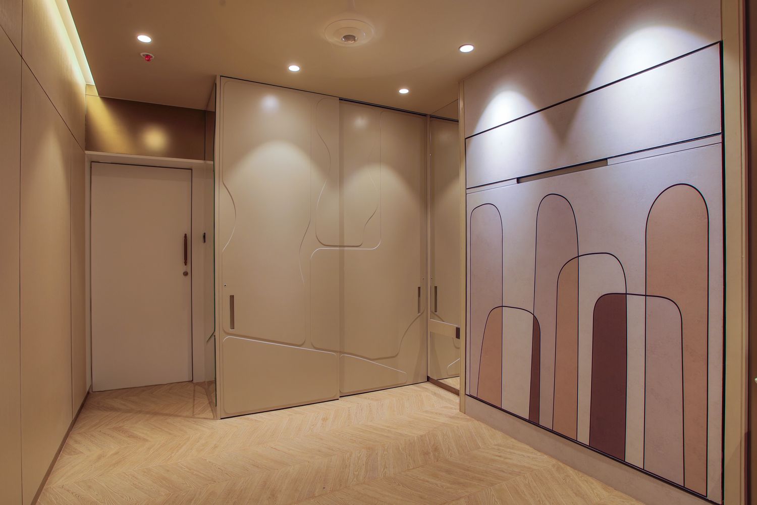 Warm architectural hallway with fluted timber panels and soft linear lighting