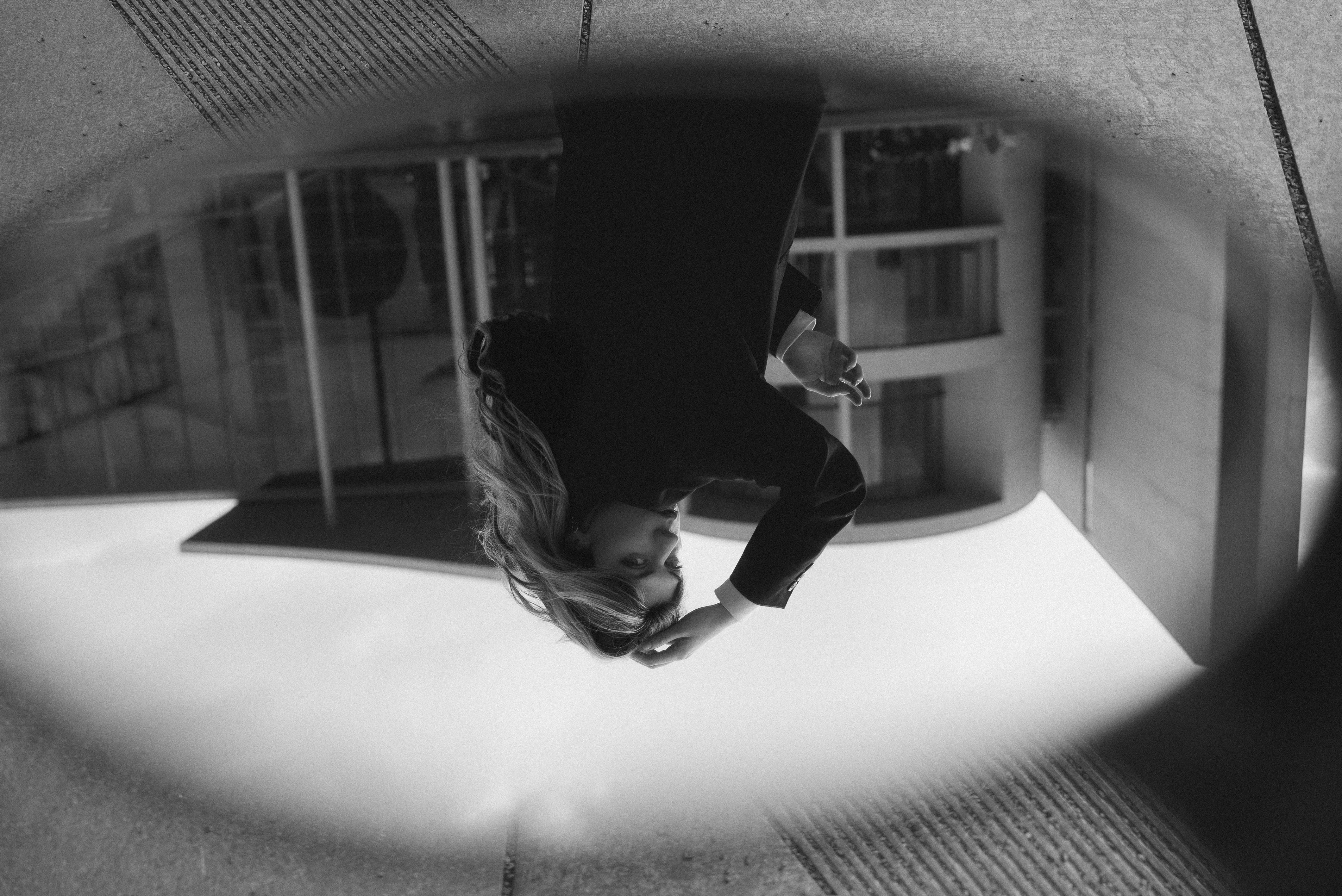 Inverted Reflection of a Beautiful Woman in a City in Black and White ...