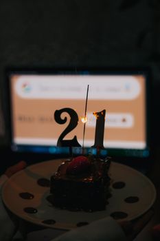 A festive 21st birthday cake with sparklers, perfect for celebrating this milestone.