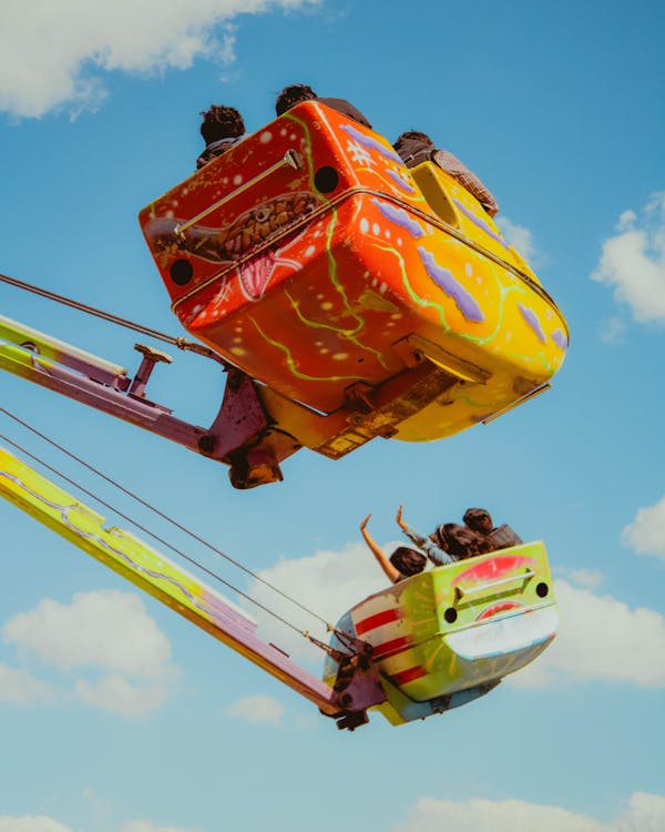 People in Carts on a Carousel