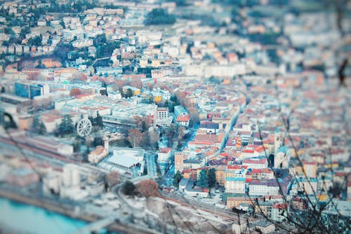A city is shown in a photo taken from above