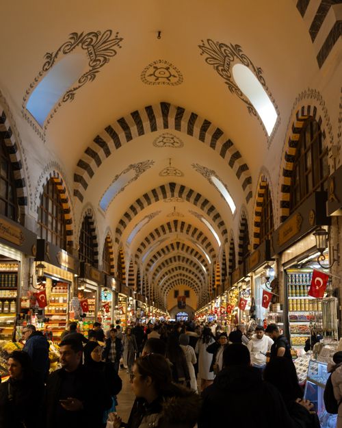 Free Crowded scene inside the historic Spice Bazaar in Istanbul, showcasing diverse shoppers and vibrant market stalls. Stock Photo