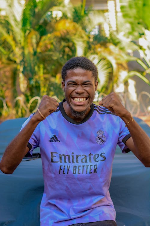 Portrait of an African Man Wearing Football Shirt 