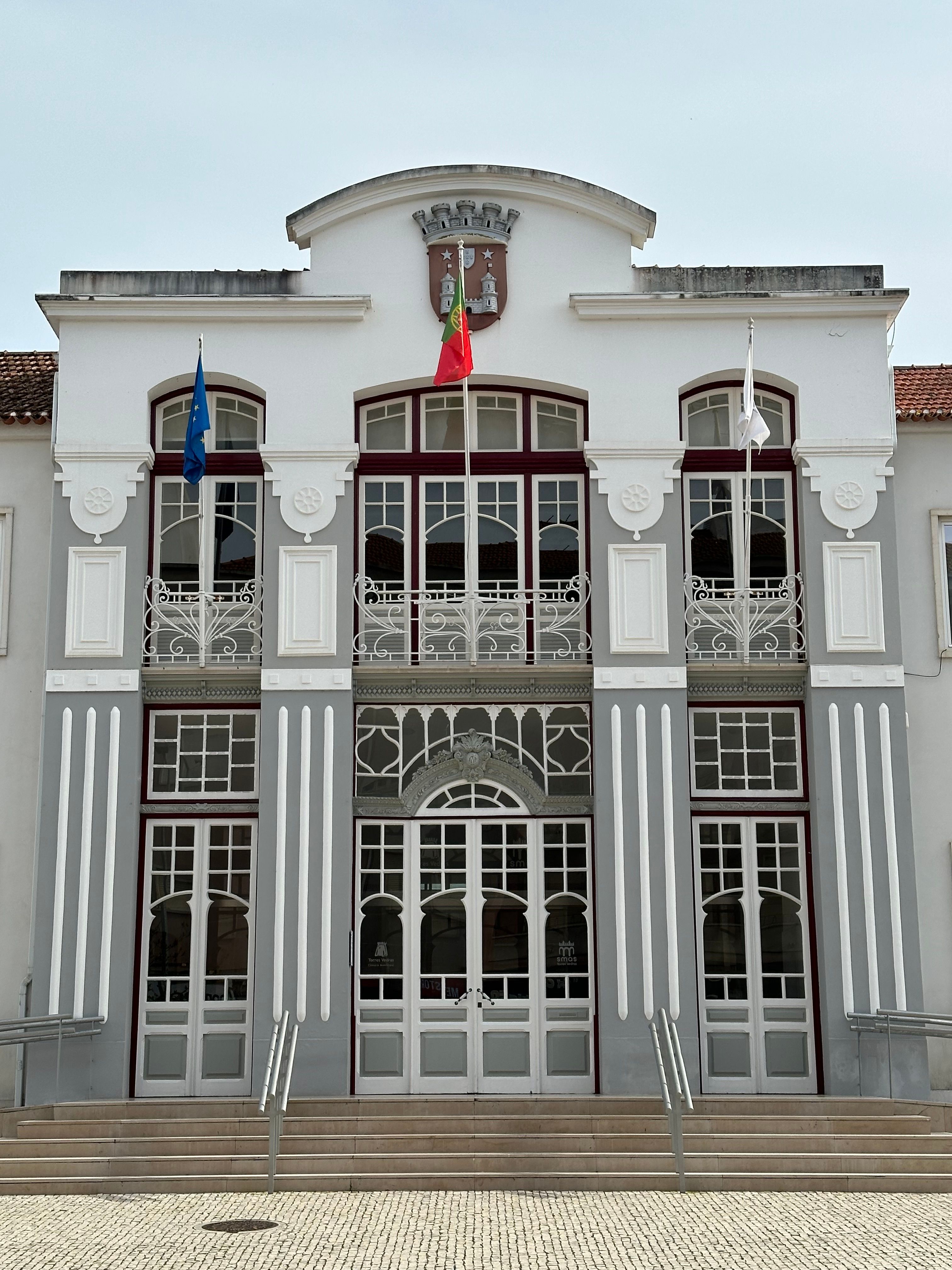 Elegant facade of a municipal building with classic architecture in Torres Vedras, Portugal.