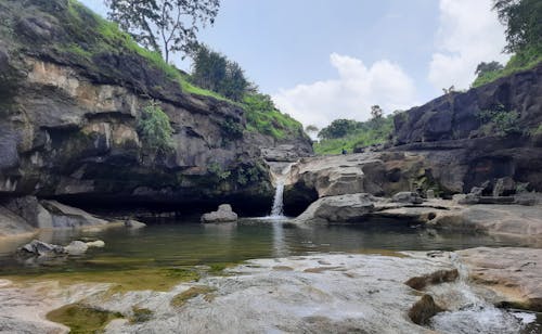 Foto stok gratis air terjun, aliran, awan