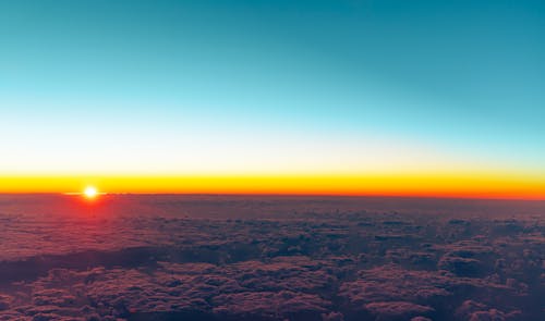 Earth Horizon Sunset Above The Clouds